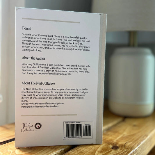 Book back cover on a wooden surface with a blurred background